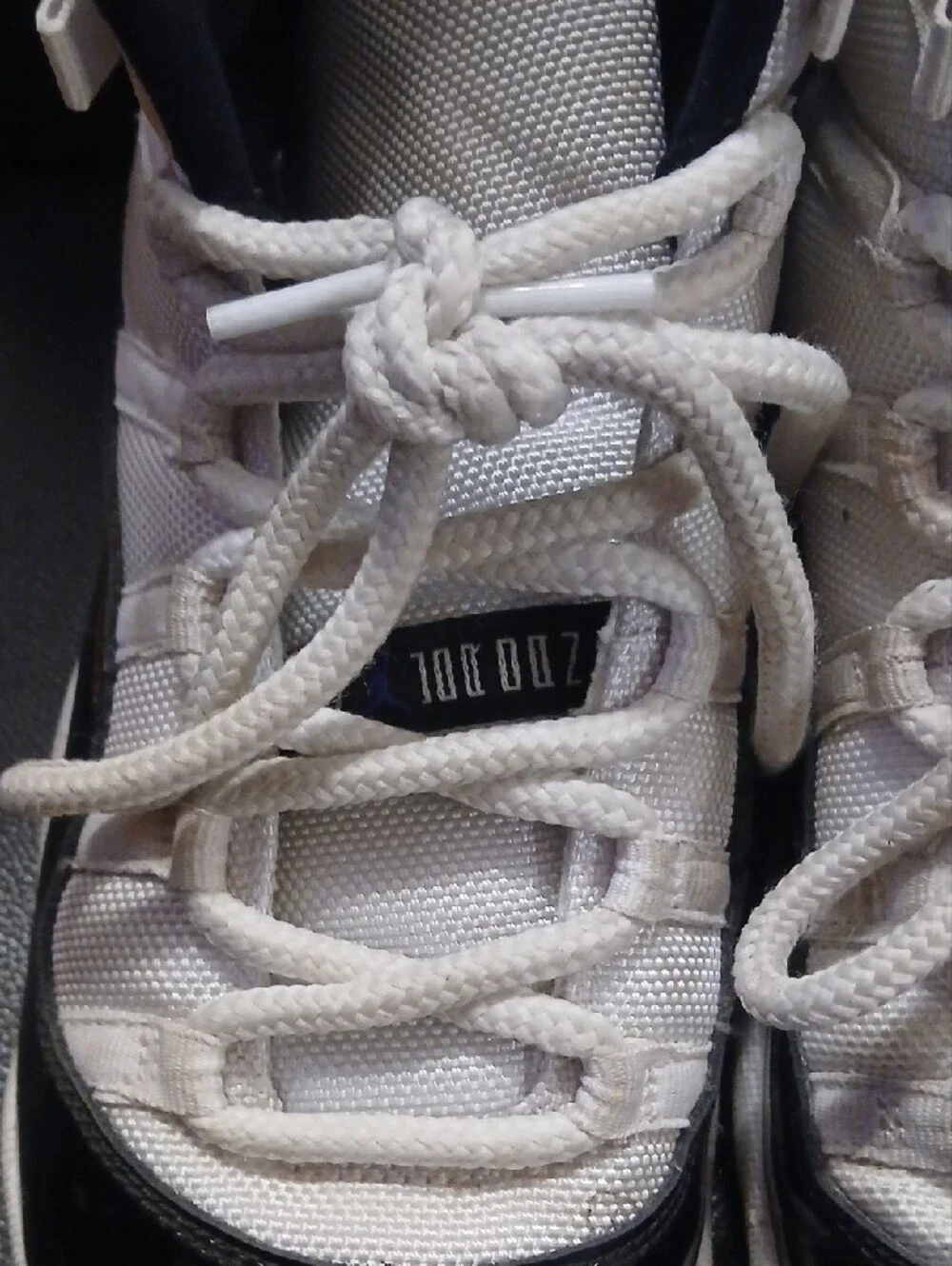 Kids White and Black Jordan High-Top Sneakers